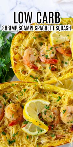 two stuffed spaghetti shells with shrimp and lemons in them on a white plate next to parsley