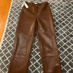 The Famous Aritzia Melina High-Waisted Vegan Leather Pants (Size 6, Regular Length) In Cognac Brown, Perfect For Day To Nightthe Piece That Can Transition With You From The Office To A Speakeasy To Bottomless Brunch The Next Day. Reposhing This Item I Purchased From @Oliviasegota. New Condition But Sadly Didn’t Like The Way They Fit Me On Me. Was Overeager And Took Off The Tags But Never Worn. These Pants Look Too Good To Stay In A Box In My Room Unwornthey Deserve To Be Worn And Loved. All Offe Fitted Leather Pants With Tapered Leg, Brown Full Length Pants For Night Out, Fitted Brown Leather Pants For Work, Fitted Full-length Pants For Fall, Fitted Full-length Fall Pants, Fitted Full Length Pants For Fall, Fitted Full Length Fall Pants, Elegant Fitted Leather Pants With Tapered Leg, Fitted Brown Leather Work Pants