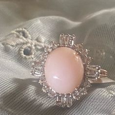 This Stunning T-Rgp 925 Sterling Ring In Size 8 Features A Beautiful Pink Opal As The Main Stone, With White Stones As Accents. The Ring Is Crafted With High-Quality Sterling Silver Metal, Ensuring Durability And Long-Lasting Beauty. The Pink Opal Is Expertly Cut And Polished To Highlight Its Natural Beauty, While The White Stones Add A Touch Of Elegance To The Design. The Rgp Brand Is Known For Its Exquisite Jewelry Pieces, And This Pink Opal And White Stone Ring Is No Exception. It Is Perfect Opal Ring Stack, White Stone Ring, Stackable Diamond Rings, Emerald Ring Gold, Vintage Silver Rings, Diamond Heart Ring, Beautiful Wedding Rings, White Stones, Bow Ring