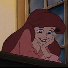 ariel from the little mermaid with her hand on her chin looking out an open window