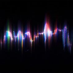 an image of colorful lines in the dark with bright colors on it's side