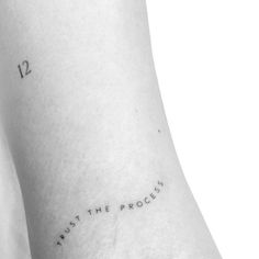 a woman's arm with the words just the process tattooed on her left side