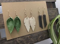 Handmade earrings crafted from scrap leather.  Start your own collection or give as gifts!  Packaged with handwritten "Rooting for You" message. Leather Earrings Diy, Leather Leaf Earrings, Beaded Jewelry Ideas, Grand Forks, Leather Earring, Leather Leaf, Earring Collection, Earring Crafts, For You