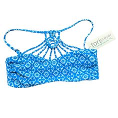 This High Neck Bikini Top With Macrame Detail And A Moroccan Tile Print Will Be A Summer Favorite! Pair It With Your Favorite Bottoms. - Adjustable Straps - Double Lined Summer Blue Strappy Halter Top, Blue Strappy Halter Top For Summer, Strappy Halter Top Blue For Summer, Blue Halter Top With Adjustable Straps For Swimming, Adjustable Blue Tankini For Vacation, Blue Halter Top With Adjustable Straps For Beach Season, Blue Halter Top With Adjustable Straps For Beachwear, Blue Bandeau Halter Top For Pool, Blue Bandeau Halter Top For Beach