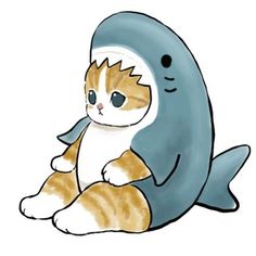 an orange and white cat sitting on top of a shark