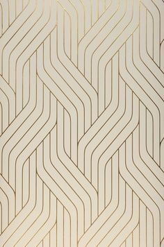 an abstract white and gold wallpaper with wavy lines in the center, as if it were made out of paper