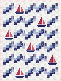 a quilt with boats on it and blue, red and white squares in the background