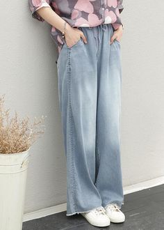 Women's pants elastic waist tie Tencel denim pants fat legs pantsMaterials used:silk cotton blendedMeasurement:Size M length 98cm / 38.22"Waist elastic from 66 / 25.74to 90/ 35.1Hip 102cm / 39.78"Leg Cir 60cm / 23.4"Inseam 29cm / 11.31"Pants Cuff 50cm / 19.5"Size L length 99cm / 38.61"Waist elastic from 66 / 25.74 to 90/ 35.1Hip 104cm / 40.56"Leg Cir 62cm / 24.18"Inseam 30cm / 11.7"Pants Cuff 52cm / 20.28"Size XL length 100cm / 39"Waist elastic from 68 / 26.52to 98/ 38.22Hip 106cm / 41.34"Leg Ci Casual High Waist Washed Pants, Casual Full-length Jeans With Elastic Waistband, Baggy Denim Blue Bottoms With Elastic Waistband, Baggy Mid-rise Bottoms With Elastic Waistband, Baggy Jeans With Elastic Waistband, Baggy Denim Pants With Elastic Waistband, Baggy Full-length Jeans With Elastic Waistband, Summer Washed Tapered Leg Bottoms, Casual Full-length Pull-on Jeans