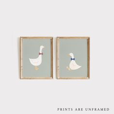 two framed pictures with ducks in bow ties on them, one is white and the other is blue