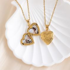 Custom Photo Locket Paw Neckalce, Pet Necklace with Photo, Memorial Jewelry, Minimalist Paw Necklace, Wedding Gift, Christmas Gift, Mom Gift 🌟Color: gold, silver 🌟Pendant size: 19×18.7MM 🌈This mini heart necklace is designed specifically for dog lovers, featuring an exquisite paw print engraving that symbolizes the deep bond with their pets. The internal customizable photo locket allows you to cherish beautiful memories with your beloved dog, making it a heartfelt gift that perfectly captures warmth and love, ideal for commemorating dog lovers. 💡Highlights: ✨Unique Paw Print Engraving Design: The exterior of the necklace is beautifully engraved with a paw print design, representing endless love and loyalty for pets. This unique design adds personality and allows every wearer to feel a Personalized Wedding Necklaces For Christmas, Wedding Heart Charm Locket Necklace, Wedding Round Locket Necklace With Heart Charm, Personalized Necklaces For Valentine's Day, Heart-shaped Jewelry For Mother's Day, Gold Locket Jewelry As Wedding Gift, Heart-shaped Stainless Steel Necklace For Wedding, Heart-shaped Stainless Steel Wedding Necklace, Valentine's Day Wedding Necklace With Adjustable Chain