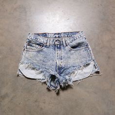 "You are looking at a great pair of vintage 80s Levi's 517 acidwashed cutoffs. Excellent vintage condition. Please see actual measurements below. Waist: 32\" Rise: 12\" Inseam: 2\" Outseam: 11\" If you would like to see additional photos or have any other questions, please do not hesitate to ask, and thanks for looking! Shipping disclaimer: All domestic orders under 16oz ship USPS Ground Advantage. All domestic orders over 16oz ship USPS priority mail. All international orders under 4lbs ship vi Acid Wash Denim Cutoff Shorts, Acid Wash Distressed Jean Shorts, Distressed Acid Wash Jean Shorts, Acid Wash Denim Jean Shorts, Casual Acid Wash Cutoff Jean Shorts, Faded Distressed Jean Shorts For Summer, Summer Distressed Faded Jean Shorts, Faded Distressed High-rise Jean Shorts, Faded Distressed High Rise Jean Shorts