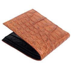 Light Brown Stomach Crocodile Skin Men's Wallet! Light Brown & Black   Constructed from genuine crocodile stomach skin leather ;  Two-tone finish:  brown on the outside and black on the inside ;  Bi-fold design;  Size closed: 4 3/8” x 3 ¾” (11 cm x 9.5 cm);  Provides 10 card slots and 2 bill compartments;  Hand-crafted wallet.   Crocodile leather is worth trying if you expect durability and allure from your wallet. Light Brown Stomach Crocodile Leather Wallet made by Bikerringshop is a designer Men's Wallet, Crocodile Skin, Crocodile Leather, Wallet Men, Card Slots, Light Brown, Leather Wallet, Slots, Two Tone