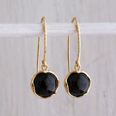 Unique Black Onyx Drop Earrings, 14K Yellow Gold Plated, Round Shaped, Fashion Jewelry for Women, Handmade By AditaGold.  These beautiful handmade black onyx dangle earrings are made of 925 sterling silver coated with 14K yellow gold. They are carefully handcrafted at my workshop in Israel. Onyx is July's birthstone, and these gemstone gold plated drop earrings will be perfect for any occasion. They are classic and elegant and will add a beautiful sparkle to a day or evening look.  Item details Round Dangle Earrings, Black Onyx Earrings, Bezel Earrings, Vintage Style Earrings, Onyx Jewelry, Fine Art Jewelry, Onyx Earrings, Silver Work, Gold Plated Earrings