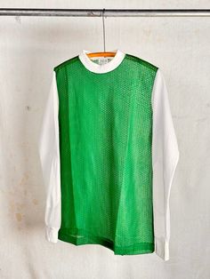 An authentic vintage blank sports jersey. long sleeve with elbow patches. era : 1970s 80s material : 100% nylon color : true green, white condition : deadstock, new and unworn as seen in photos size : tagged adult medium , please compare measurements below actual garment measurements : chest : 20" pit to pit   shoulder : 17.5" sleeve : 27.5" length : 29" - - - - - - - - - - - - - - - - - - - - - - - - - - - - - - - - - - - - - - - -  INTERNATIONAL SHIPPING AVAILABLE UPON REQUEST Craft Union does NOT accept returns or exchanges, all items are FINAL SALE Please consider the following prior to placing an order : Because measurements are provided, Craft Union does NOT grant refund/exchange requests if an item does not fit. We are always happy to assist interest buyers with any size/fit concern Retro Green Tops For Sports, Retro Green Sports Top, Green Sporty Long Sleeve Top, Retro Long Sleeve Top For Sports Events, Jersey Long Sleeve, Elbow Patches, Vintage 1970s, True Vintage, Long Sleeve T Shirt