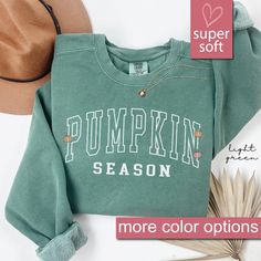 *We Are Not Affiliated With Any Other Company, Brand, Or Business. 8/8/24 - This Is A Premium Comfort Colors® Heavy Blend Unisex Crewneck Sweatshirt - Get cozy this fall with our Comfort Colors® Pumpkin Season Sweatshirt, perfect for autumn vibes and Halloween festivities. This cute Fall Sweatshirt is an ideal Thanksgiving Gift and a must-have for those who love Pumpkin Spice and retro Halloween style.  Whether you're searching for Halloween Sweaters For Women or a sweater for the Thanksgiving s Customizable Sweatshirt For Fall And Gifts, College Team-colored Sweatshirt For Fall, Blue Playful Fall Sweatshirt, Playful Green Fall Sweatshirt, Fall Relaxation Crew Neck Sweatshirt, Halloween Sweaters, Autumn Sweater, Sweater Pumpkins, Halloween Festivities