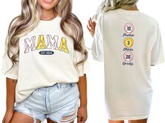 "Elevate your game day look with our custom \"Mama\" of both softball and baseball shirt, personalized with player names and the year. This crewneck tshirt is the perfect baseball or softball gift for moms, offering both style and sentimentality for those memorable moments at the ballpark. COMFORT COLORS 1717 SHIRT: Unisex 100% US cotton - ethically grown and harvested Pre-Shrunk Fabric Relaxed Fit - Size up for a trendy oversized look Seamless Sides Double Needle Stitching Garment-dyed  CARE IN Customizable White T-shirt For Game Day, Game Day Customizable White T-shirt, Baseball Mom Outfits, Mama Of Both, Softball And Baseball, World Series Shirts, Softball Mama, Custom Softball, Softball Mom Shirts