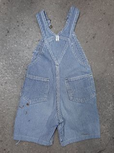 "Kid's vintage hickory stripe short overalls by Key \"Imperial\" Aristocrat of Overalls Made in U.S.A No Tag. Approximately sz. 3T Measurement taken laying flat: Waist: 11\" Front Rise: 7.5\" Length (from top of bib to hem of leg): 18.5\" Inseam: 5.5\" Features several discolouration marks, as pictured. International Shipping available" Striped Cotton Overalls For Spring, Vintage Bib Front Shortalls For Spring, Vintage Cotton Shortalls For Spring, Retro Cotton Shortalls With Bib Front, Vintage Shortalls With Pockets, Vintage Cotton Shortalls With Pockets, Spring Striped Cotton Overalls, Retro Cotton Bib Front Shortalls, Striped Cotton Overalls