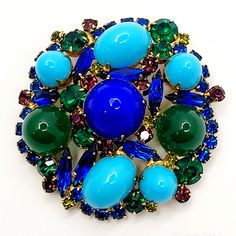 Big Juliana Brooch From The 1960's. All Prone Set Rhinestones And Acrylic Cabochons. There Is A Small Scuff On The Center Acrylic Cab. 2.5". Green Round Brooch Jewelry, Juliana Jewelry Vintage Brooches, Vintage Multicolor Round Brooches, Vintage Gold Cabochon Brooch, Juliana Jewelry, Green Brooch, Luxury Green Pendant-shaped Brooches, Vintage Costume Jewelry, Vintage Costumes