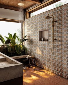 a bathroom with tiled walls and tile flooring