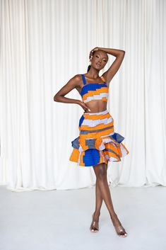 Fitted Multicolor Sets With Tiered Skirt, Fitted Multicolor Ruffled Mini Skirt, Fitted Multicolor Tiered Mini Skirt, Fitted Multicolor Tiered Skirt, Fitted Orange Skirt, Fitted Orange Mini Skirt, Orange Fitted Mini Skirt, Fitted Orange Skort, Fitted Orange Cotton Skirt