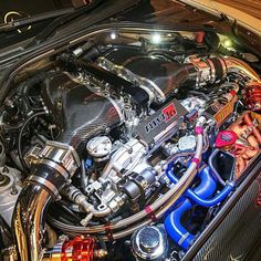 the engine compartment of a sports car is shown