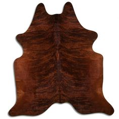 a brown cowhide rug on a white background