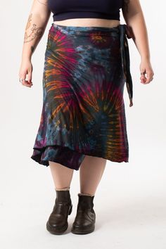 Variety is the spice of life, and this magic wrap skirt is ready to spice up your wardrobe. Versatile, stretchy, and oh so comfy, you can style this tie dye skirt in many ways, wear it as a tie dye shawl, fashion it as a tie dye dress, or style it as a classic wrap skirt, the fashion world is your oyster. Which way will you wear yours? Fitted Tie Dye Bohemian Skirt, Bohemian Tie Dye Tiered Skirt, Bohemian Tiered Tie Dye Skirt, Fitted Bohemian Tie Dye Skirt, Fitted Bohemian Tie-dye Skirt, Bohemian Rayon Skirt For Festival, Hippie Tie-dye Skirt For Festival, Tie Dye Bohemian Skirt, Magic Wrap Skirt