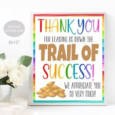 a card saying thank you for leading us down the trail of success