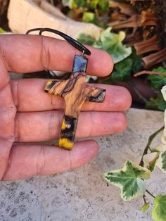 "Unique cross pendant, a pendant made of olive wood and resin in black/red/color. Homemade from the dried olive wood tree (more than 100 years old). Made in the home craft. Shaped perfectly. Each piece is unique. Comes in a decorative box, ready as a gift. Creation of unique personalized jewelry is the mission.  The quality of the performance of each piece of jewelry and the same love and dedication to each of them is the premise. Behind the name \"Jewelry Istria\" stands a small home workshop whose goal is to offer the market a different, more personal jewelry." Resin Cross, Men Christmas Gift, Christian Cross Necklace, Cross Necklace For Women, Personal Jewelry, Religious Symbols, Symbolic Jewelry, Same Love, Home Workshop