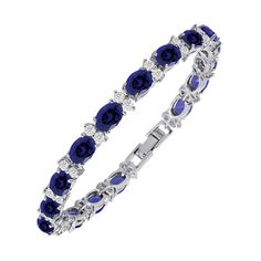 PRICES MAY VARY. AFFORDABLE CUBIC ZIRCONIA TENNIS BRACELET WITH DIAMOND-LIKE BRILLIANCE: With gorgeous White Round CZ, Oval Cut simulated Blue Sapphire Gemstones accentuated by Silver Plated Brass, this Tennis Bracelet will add a diamond-like brilliance to any outfits; go on, enjoy the radiance of CZ and simulated gemstones at only a fraction of the price of real diamonds and precious stones. CHARMING GEMSTONE BRACELET FOR ALL OCCASIONS: The perfect present for anniversaries, weddings, graduatio Blue Diamond Bracelets, Blue Tennis Bracelet, Oval Cubic Zirconia Tennis Bracelet With Gemstones, Oval Gemstone Cubic Zirconia Tennis Bracelet, Oval Cubic Zirconia Tennis Bracelet, Oval Cubic Zirconia Bracelets With Gemstones, Blue Sapphire Bracelet, Cubic Zirconia Bracelet, Silver Bracelets For Women