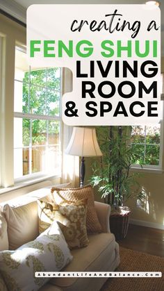 a living room with couches, lamps and windows in front of the words creating a feng shui living room & space