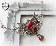 ♥♥Noir Romantique♥♥ Welcome to my store! This delicate silver necklace featuringtwo oxidized sterling silver plated stampings .A silver crown setting holding a dark carnelian gem 25x18mm is set over the plaque and is also decorated with two silver wings. This is an every day wearing necklace. . I make this necklace adjustable to fit all necks.Nevertheless if you need a specific length let me know ♥♥ Nickel and lead free ♥♥All metal components are silver plated brass of high quality, profesionall Gothic Winged Jewelry For Gifts, Gothic Winged Jewelry Gift, Delicate Silver Necklace, Gothic Pendant, Gothic Necklace, Silver Wings, Silver Crown, Victorian Gothic, Gothic Jewelry