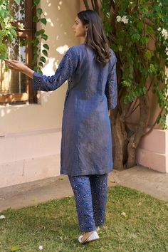 Blue kurta with thread, sequin embroidery in floral pattern. Paired with pant. - Aza Fashions Chanderi Sequin Straight Kurta, Blue Cotton Silk Salwar Kameez With Mirror Work, Fitted Indigo Kurta With Chikankari Embroidery, Fitted Indigo Kurta With Resham Embroidery, Chanderi Sets With Sequins And Straight Kurta, Fitted Kurta With Chikankari Embroidery And Straight Pants, Designer Blue Sequin Kurta, Designer Blue Salwar Kameez With Sequins, Designer Blue Sequined Salwar Kameez