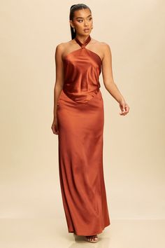 Indulge in effortless elegance with our Graceful Tie Halter Maxi Dress. Crafted from luxurious fabrics, this dress features a flattering tie halter neckline and a flowy maxi silhouette. Perfect for any special occasion, this dress will make you feel like a true fashion icon. Self: 98%Polyester 5%Spandex Lining: 100%Polyester Silk Halter Neck Dress For Prom, Silk Halter Dress For Prom, Gala Slip Dress With Tie Back In Maxi Length, Maxi Slip Dress With Tie Back For Gala, Silk Halter Neck Evening Dress, Chic Silk Halter Dress For Prom, Halter Neck Maxi Dress For Date Night, Prom Halter Tie-back Maxi Dress, Date Night Halter Neck Maxi Dress