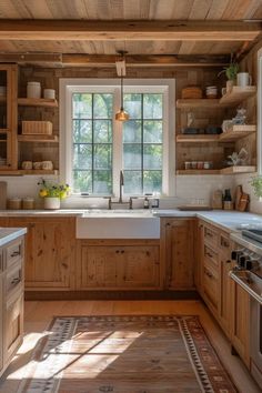 a kitchen with wooden walls and flooring has an area rug on the floor that matches the cabinets