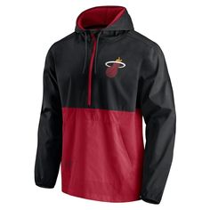 Defend against rainy weather in this Miami Heat Anorak Block Party Windbreaker hoodie jacket from Fanatics Branded. Its two-tone design features printed Miami Heat graphics and a half-zip closure for maintaining the perfect temperature. An adjustable hood with mesh lining also helps block the elements without bringing too much heat. 1/2-Zip Brand: Fanatics Branded Elastic cuffs Front pouch pocket Imported Lightweight jacket suitable for mild temperatures Long sleeve Machine wash, tumble dry low Half-zip Winter Windbreaker For Outdoor Activities, Black Long Sleeve Sports Raincoat, Sporty Long Sleeve Hooded Jacket For Rainy Weather, Sports Weatherproof Long Sleeve Windbreaker, Sporty Long Sleeve Windbreaker For Rainy Weather, Casual Windproof Nylon Hoodie, Hooded Raincoat With Drawstring Hood For Outdoor Activities, Black Hoodie Windbreaker For Outdoor, Fall Sports Black Raincoat