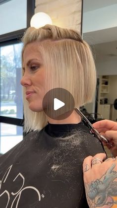 Chris Jones on Instagram: "WHAT IS A FLOATING BOB?

First of all, why did we undercut the back? @jocelyn.mcclellan wanted something a little edgier that had tons of texture and movement. I treated the undercut the same way I would cut a graduated bob. By “stacking” the underneath it actually builds shape underneath promoting fullness and roundness in the back. If we had shaved it, that would have debulked the underneath causing the shape to collapse giving us the opposite result. 

The rest of the haircut was treated like a textured bob. Imagine one haircut living on top of another. The disconnection of the two naturally promotes movement and texture BUT with shape. I wanted a hint of stacking without it looking like a graduated (stacked) bob. 

Curled with a 1.25” iron but you can use a f Stacked Bob Haircut With Undercut, Short Bob Shaved Back, Slightly Graduated Bob, Straight Fine Haircut, Short Concave Bob Hairstyles, Stacked Blonde Bob Haircut, Textured Chin Bob, Inverted Undercut Bob, Undercut Hair Short