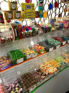 a display case filled with lots of different types of candies