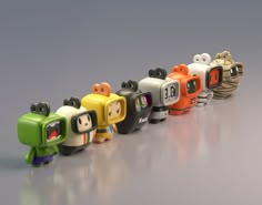 a row of small toy figures sitting next to each other