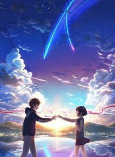 two people holding hands in front of the sky