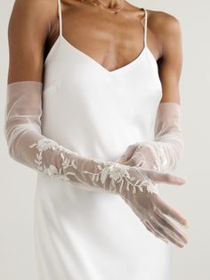 Halfpenny London's 'Elizabeth' gloves will make an elegant finishing touch to your wedding day ensemble. They're made from sheer tulle that's hand-embroidered with crystal and sequin roses, thoughtfully arranged to draw attention to your ring finger. Elegant Fitted Bridal Accessories For Party, Elegant Lace Bridal Accessories For Evening, Elegant Lace Bridal Accessories For Formal Occasions, Fitted Lace Bridal Accessories For Mother Of The Bride, Formal Fitted White Bridal Accessories, Lace Bridal Accessories Fitted For Mother Of The Bride, Elegant Fitted Lace Bridal Accessories, Elegant Fitted Bridal Accessories For Evening, Elegant Organza Bridal Accessories For Ceremony