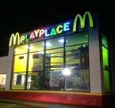 the front of a mcdonalds at night