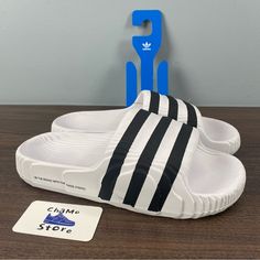 Brand New. Never Worn. No Box . I Carefully Package And Ship Immediately. Let Me Know If You Have Any Questions. Men Sz 10,11 Ship Same Or Next Business Day! 100% Authentic! Touch The Follow Bottom To Get Updated Every Day About New Deals. Adidas Sporty Flat Slides, Sporty Flat Adidas Slides, Adidas Slide Sandals For Streetwear, White Adidas Slides With Synthetic Material, White Adidas Synthetic Slides, Adidas Non-slip Sandals For Streetwear, Adidas Logo Sandals For Summer Streetwear, Adidas Slides With Rubber Sole For Streetwear, Adidas Non-slip Slides For Streetwear