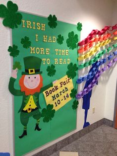 a bulletin board with st patrick's day decorations on the front and back wall