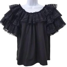 Found this beautiful 1980's top at a charity shop: Made of woven polyester + cotton blend and massive chunky layers of beautiful black lace that flounces and fans out like wings.  Who says wearing black is boring when there's this kind of drama?   ...The volume of the lace screams 80's maximalism!  Thought this was a flamenco or Mexican souvenir blouse, until I saw the boutique San Diego, California tag. When I looked up the name, "Audrey Coleman" for other garments, they span back to the 1960's.  The few dresses that turned up in my surfing were dirndls and square dance styles.  I couldn't find much info/fully detailed obituary online, and only found she was possibly Jewish and died in 2021.   I then posted on a community bulletin board, and got responses from both her former neighbors an Square Dance Blouses, Chunky Layers, Restaurant Uniform, Restaurant Uniforms, Dance Styles, Vintage Plus Size, Vintage Restaurant, Square Dance, California Design