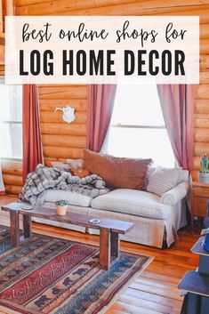 a living room with wooden walls and flooring, the words best online shops for log home decor