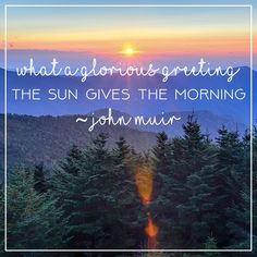 the sun is setting over some trees and mountains with a quote from john mulr