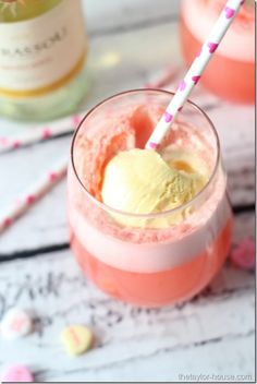 two glasses filled with ice cream on top of a table