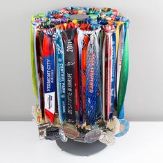 a bunch of medals that are in a holder