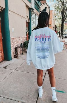 Self Love World Tour Sweatshirt  - Printed on front and back  Mental Health Aesthetic Trendy Sweatshirt  Please note, this sweatshirt is not oversized. If you want an oversized fit, order 2-3 sized above your usual size. For example, if you are a size Small, choose between a size Large or XL, depending on how large you like it. Please refer to our size chart in the photos for exact dimensions. This crewneck sweatshirt is pure comfort. Made from a soft cotton/poly blend with no itchy side seams, Graphic Crewneck Sweatshirt Outfit, Oversized Graphic Sweatshirt, Aesthetic Sweatshirt Design, Inspirational Sweatshirts, Trendy Sweatshirts Hoodie, Oversized Sweatshirt Aesthetic, Cricut Sweatshirt, Crew Neck Sweatshirt Aesthetic, Cute Sweatshirt With Text Print For Streetwear